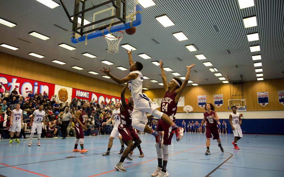 Ramstein Royal Keith Little goes up for a layup at Ramstein Air Base, Germany, on Friday, Dec. 4, 2015. The Royals beat the visiting Vilseck Falcons 51-33.