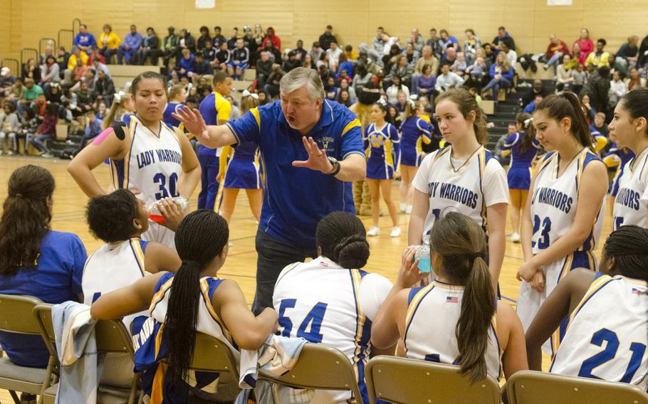 Wiesbaden coach Jim Campbell addresses his players during a break in a girls basketball game Friday, Jan. 8, 2016 in Wiesbaden. Host Wiesbaden, two-time defending champion of Division I, defeated the Cougars of Ansbach 42-20.