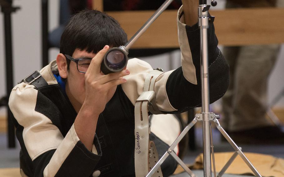 Mario Rivera, a junior marksman for Ansbach, checks the placement of his shots during the third conference match of the 2016 DODDS-Europe eastern  marksmanship season held at Vilseck, Germany, Saturday, Jan. 9, 2016. 