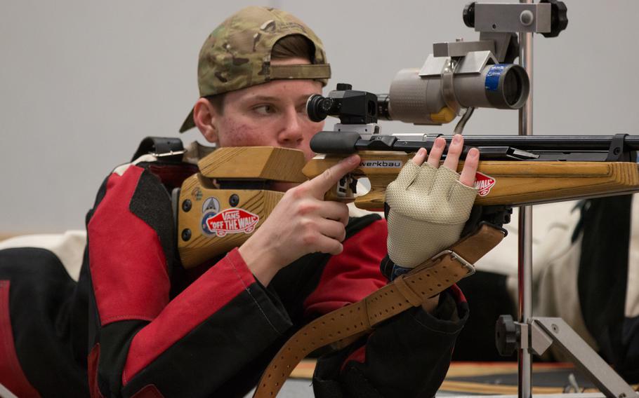 Hohenfels' Trey Broach sights in during the third eastern  conference match of the 2016 DODDS-Europe marksmanship season held at Vilseck, Germany, Jan. 9, 2016. Broach shot 263, a personal best.