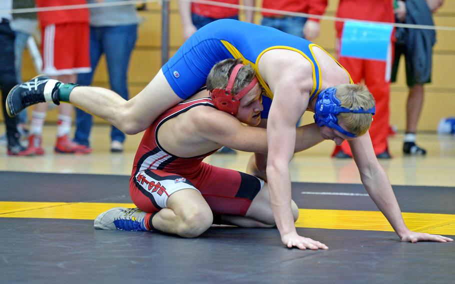 Kaiserslautern's Thaniel Hrushka gets underneath Sigonella's Austin Brehmer as he tries to flip him in a 152-pound match in first-round action at the DODDS-Europe wrestling championships in Wiesbaden, Germany, Friday, Feb. 19, 2016. Hrushka went on to win the match.