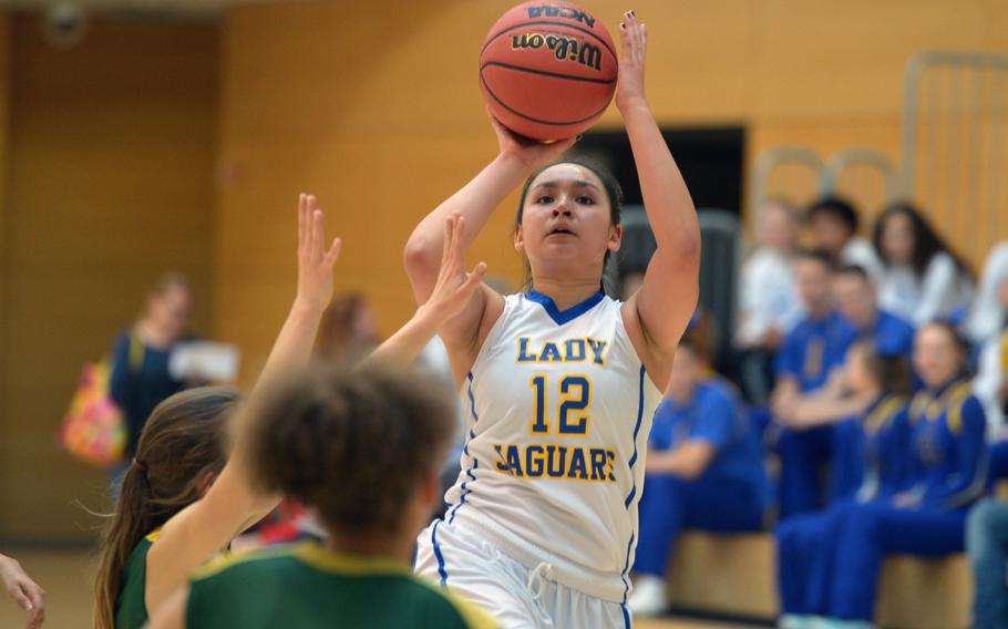 Sigonella's Marika Wojtal looks to shoot or pass against Alconbury in a Division III game at the DODDS-Europe basketball championships in Wiesbaden, Germany, Wednesday, Feb. 24, 2016. Sigonella won 31-24.