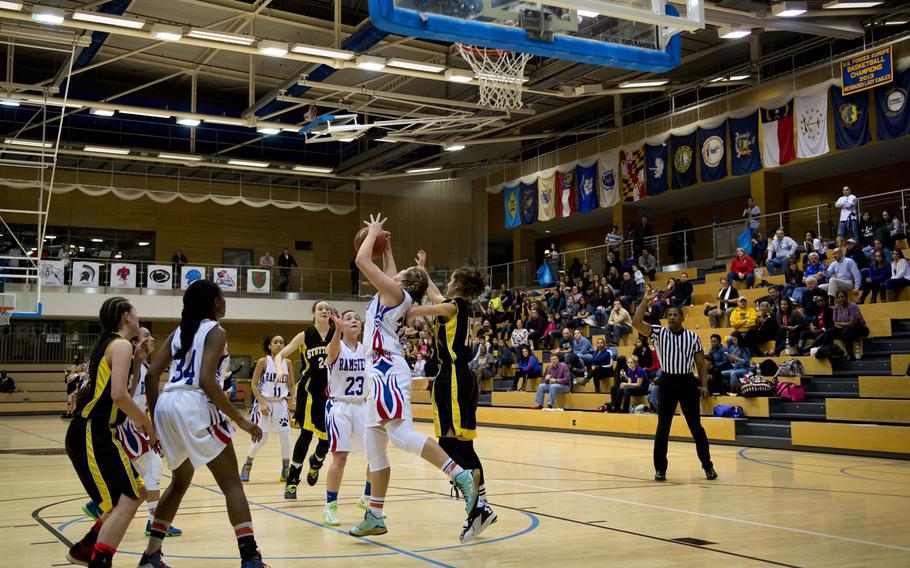 Ramstein's Lindsey Breton gets a rebound during a DODDS-Europe Division I semifinal game against Stuttgart at Clay Kaserne, Germany, Friday, Feb. 26, 2016. Ramstein defeated Stuttgart 31-30. 