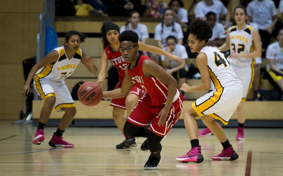 Kaiserslautern's Byanca Powell dribbles the ball down the court during a DODDS-Europe Division I semifinal game against Vicenza at Clay Kaserne, Germany, Friday, Feb. 26, 2016. Vicenza won 46-29. 