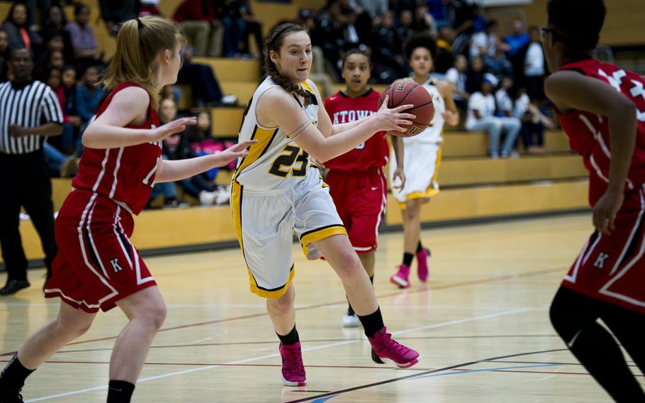 Vicenza's Emma Knapp tries to dribble past Kaiserslautern's Althea Honan during a DODDS-Europe Division I semifinal game at Clay Kaserne, Germany, Friday, Feb. 26, 2016. Vicenza beat Kaiserslautern 46-29. 