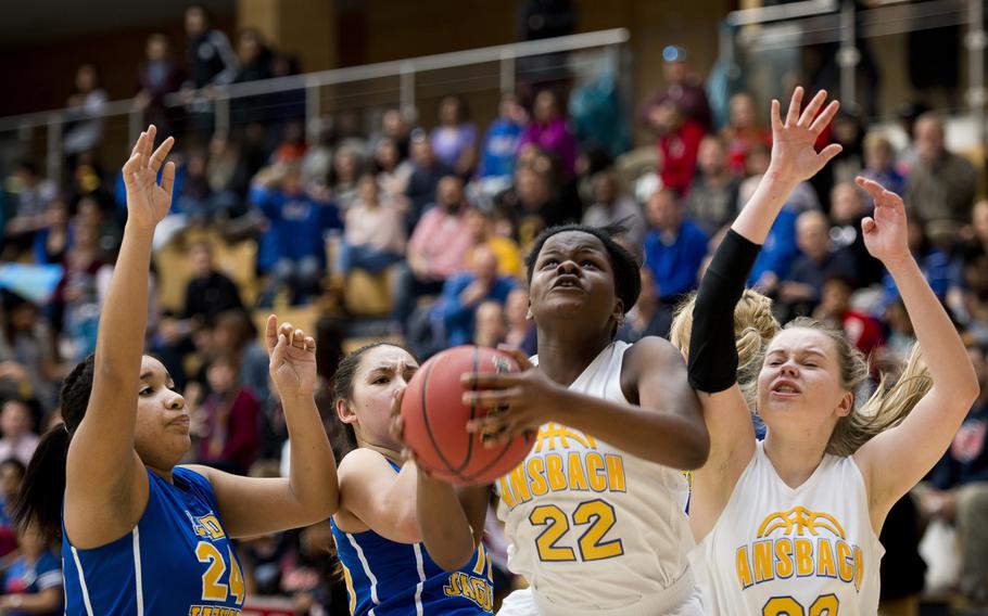 Ansbach's Sabiana Edouard goes for a shot during the DODDS-Europe Division III championship game in Wiesbaden, Germany, Saturday, Feb. 27, 2016. Ansbach beat Sigonella in double overtime 34-30 to win the title.