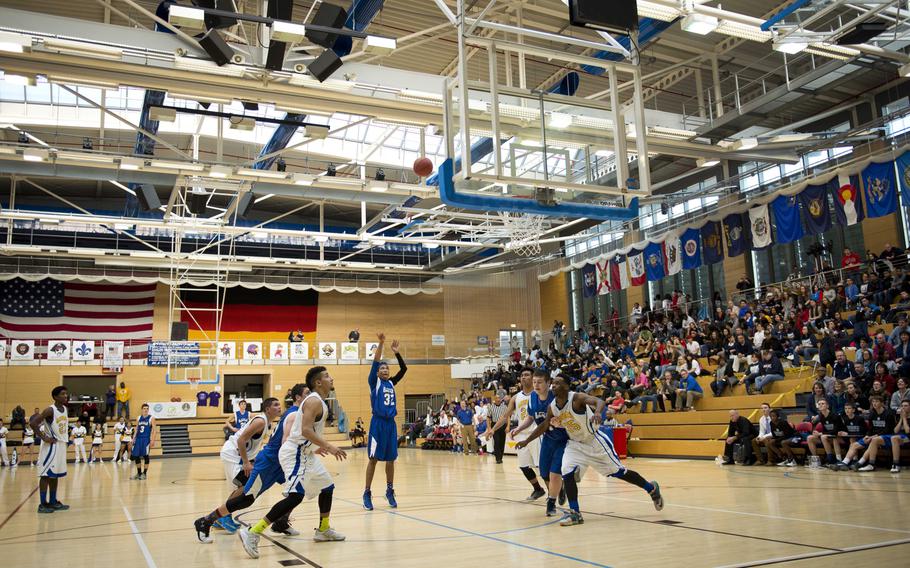 Brussels' Paul Hubbard sinks a free throw during the DODDS-Europe Division III championship game in Wiesbaden, Germany, Saturday, Feb. 27, 2016. Brussels beat Ansbach 41-38 to win the title. 