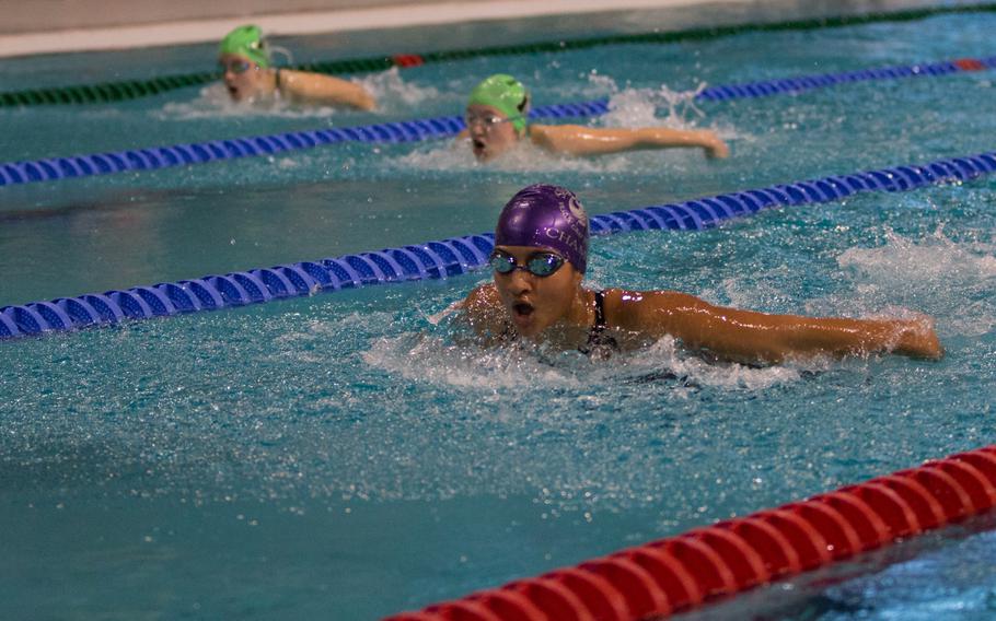 Melinda Montesinos, a swimmer from the Vilseck-Grafenwöhr Vipers, leads Naples' Annie DeCastro and Sydney Hale during the girls' 11-year-old 50-meter butterfly during the 2016 European Forces Swim League Championship held in Eindhoven, Netherlands, Saturday, Feb. 27, 2016. 