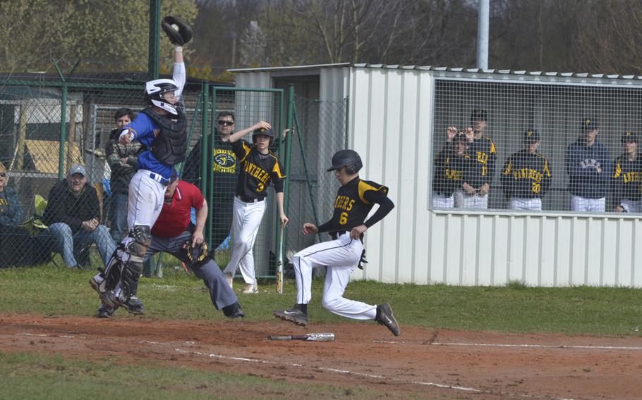 Kohl Kraus of Stuttgart slides into home plate during a baseball game between Wiesbaden and Stuttgart, Saturday, March 26, 2016 at Clay Kaserne in Wiesbaden. Host Wiesbaden took both games of a doubleheader, coming from behind each time.