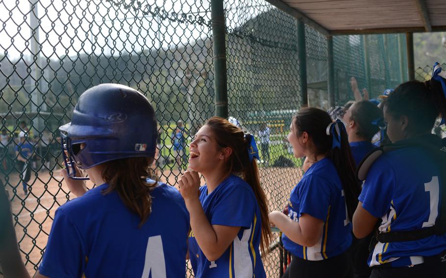 Sigonella sophomore Gracie Gonzalez cheers with her team during its softball matchup against Vicenza in Naples, Italy, on Saturday, April 2, 2016. 