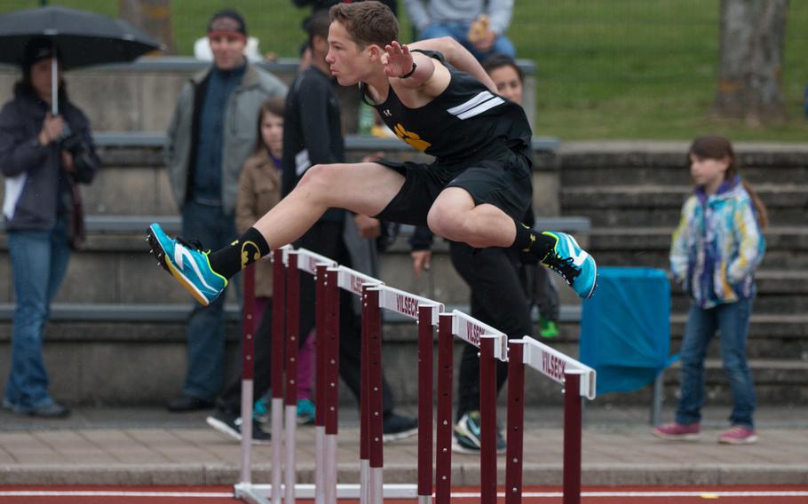 Stuttgart's Samuel Kress clears a hurdle during one of the earliest events of the DODEA-Europe track meet held in Vilseck, Germany on Saturday, April 23, 2016.