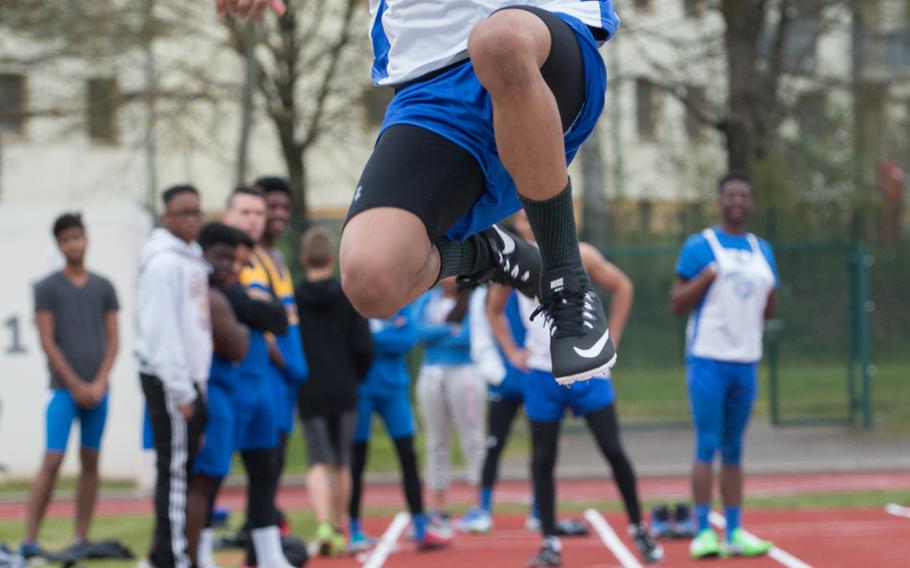 Hohenfels' Wade Cooper gets some air during the long jump at the multi-school track meet held Saturday, April 23, 2016, in Vilseck, Germany. Cooper ended with a distance of 15 feet. 