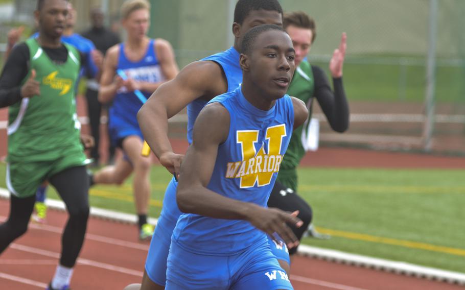 Andre Sterling of Wiesbaden takes the baton as the second leg in the boys' 4x100-meter relay during an 11-team meet at Wiesbaden, Saturday, April 23, 2016. The meet gave coaches and teams a good look at where their squads stand a month before European championships in May.