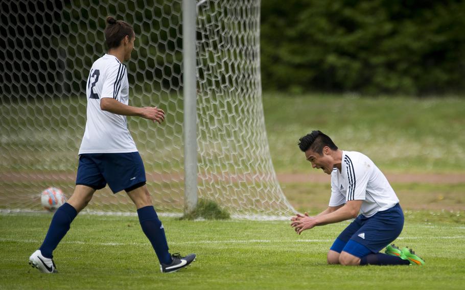 Black Forest Academy's Hanul Kang, right, celebrates after scoring a goal during the DODEA-Europe soccer tournament in Landstuhl, Germany, on Wednesday, May 18, 2016. Black Forest Academy beat Aviano 4-0.