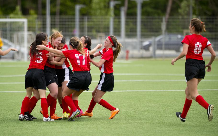 The AOSR Falcons celebrate after a goal during the DODEA-Europe soccer tournament in Landstuhl, Germany, on Thursday, May 19, 2016. AOSR defeated Bitburg 2-0.