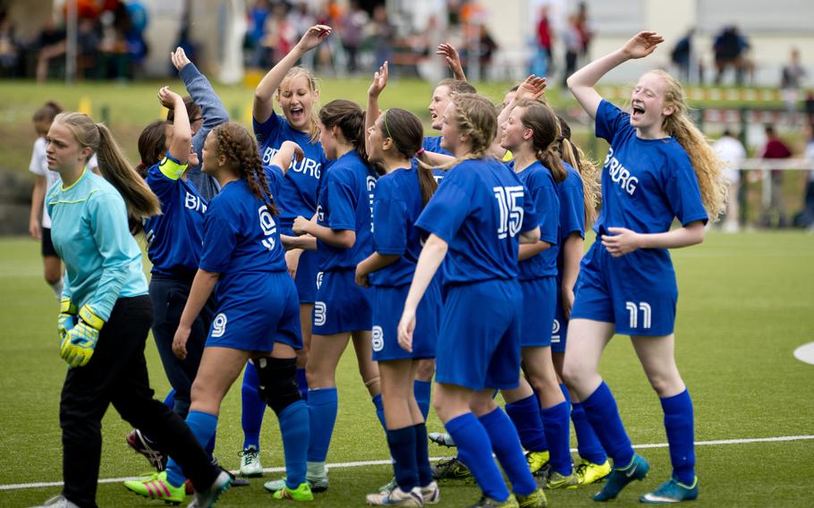 Bitburg celebrates after defeating Aviano during the DODEA-Europe soccer semifinals in Reichenbach, Germany, on Friday, May 20, 2016. Bitburg won the match 5-3.