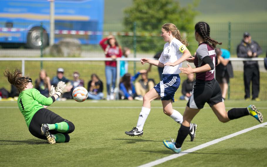 AFNORTH goalkeeper Abigail Stanley blocks Black Forest Academy's Anna Kragt's shot during the DODEA-Europe soccer semifinals in Reichenbach, Germany, on Friday, May 20, 2016. AFNORTH lost the match 3-1.