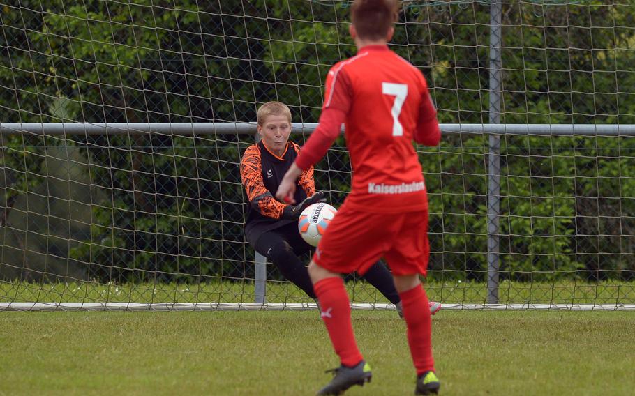 Lakenheath's Zachary Moenter stops Alex DeBella's shot to win the shootout against Kaiserslautern in a Division I semifinal at the DODEA-Europe soccer championships in Reichenbach-Steegen, Germany, Friday May 20, 2016. Moenter stopped two shots in the shootout. The game was tied at 2-2 after regulation and overtime.