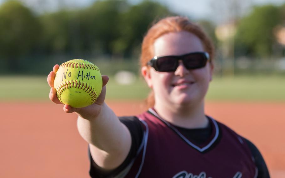 Vilseck's Avery Hicks holds the game ball she received after pitching a no-hitter against the Baumholder Buccaneers on Friday, May 20, 2016. 
