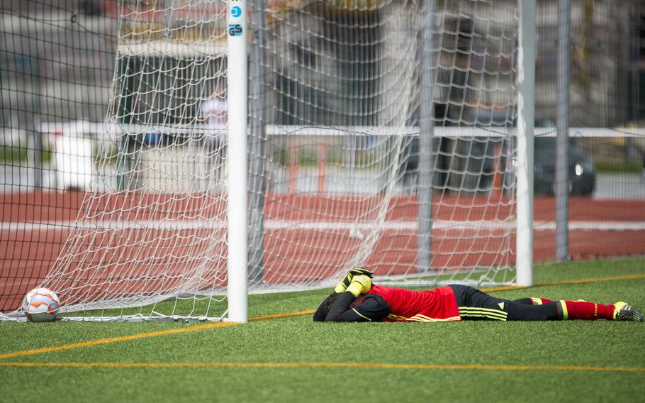 Brussels goalkeeper Dominick Defazio reacts after missing a block during the DODEA-Europe soccer Divison III championship in Kaiserslautern, Germany, on Saturday, May 21, 2016. Brussels lost to Alconbury 5-4 after a shootout.