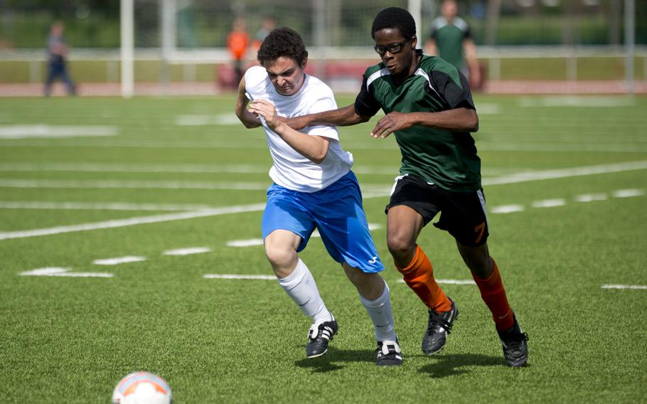 AFNORTH's Jordan Clement, right, and Marymount's Germano Piccirilli race for the ball during the DODEA-Europe soccer championship in Kaiserslautern, Germany, on Saturday, May 21, 2016. AFNORTH lost the Division II game 7-0.