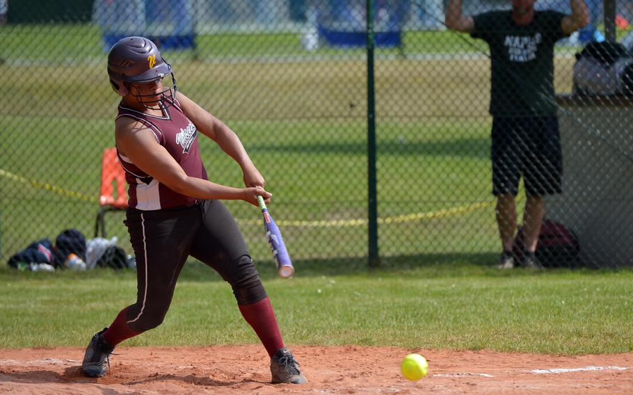 Vlseck's Mianie Dean hits one up the middle in a Division I game against Naples at the DODEA-Europe softball championships in Ramstein, Germany, Thursday, May 26, 2016.