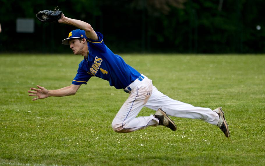 Wiesbaden's Alex Newton makes a diving catch during the DODEA-Europe baseball tournament in Kaiserslautern, Germany, on Thursday, May 26, 2016. Wiesbaden defeated Vilseck 14-1.
