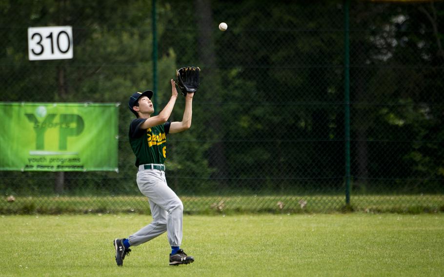 SHAPE's Anthony Dellorso catches a fly ball during the DODEA-Europe baseball tournament at Ramstein Air Base, Germany, on Friday, May 27, 2016. SHAPE lost the game 7-6.