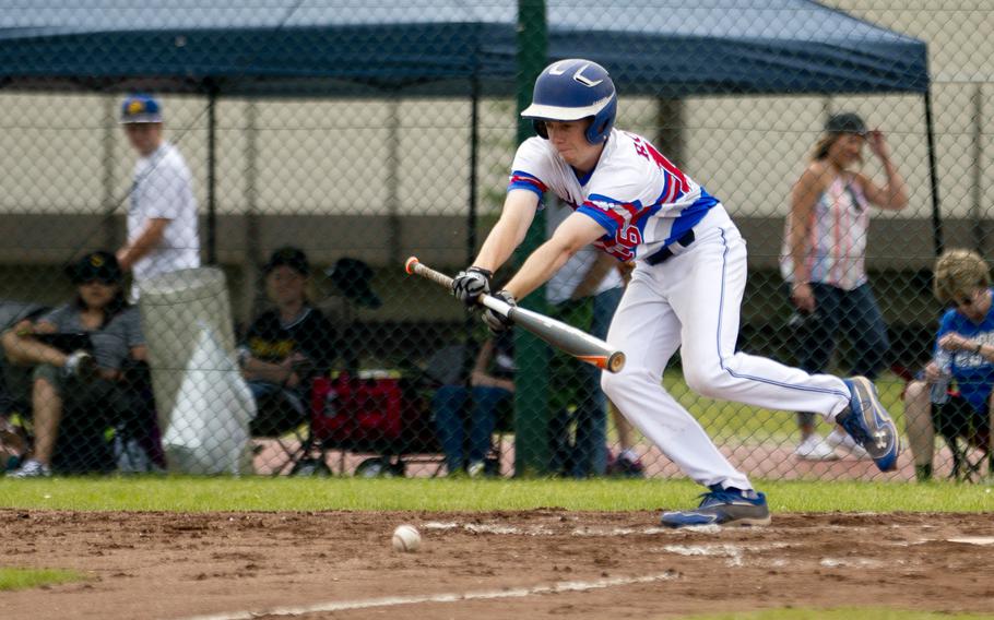 Ramstein's Daniel Thompson bunts the ball during the DODEA-Europe baseball tournament at Ramstein Air Base, Germany, on Friday, May 27, 2016. Ramstein defeated SHAPE 7-6.