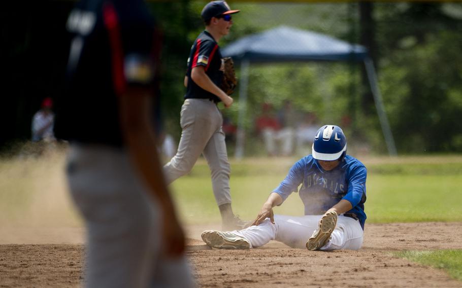 Rota's Derek Pena hangs his head after being tagged out at second during the DODEA-Europe Division II/III baseball championship at Ramstein Air Base, Germany, on Saturday, May 28, 2016. Rota defeated Bitburg 5-4 to win the title.