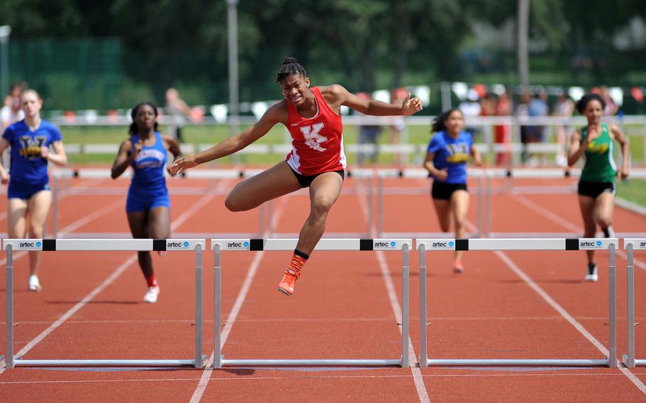Kaiserslautern's Jada Branch clears the last hurdle on her way to winning the girls 300-meter hurdles event at the DODEA-Europe track and field championships in Kaiserslautern, Germany, Saturday, May 28, 2016. She won in 45.38 seconds to capture her third gold of the championships. Earlier she captured the long jump title and Friday she won the triple jump.
