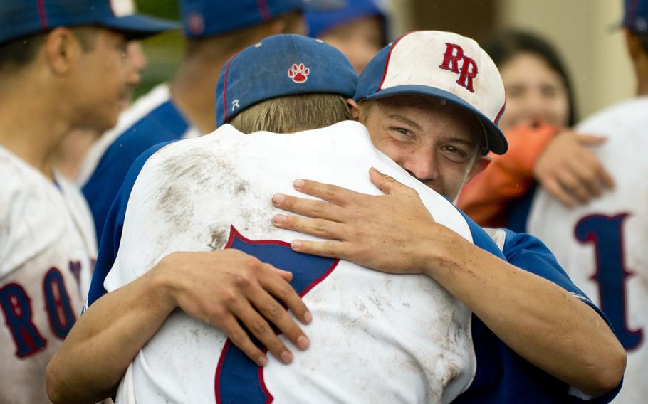 The Ramstein Royals celebrate winning the DODEA-Europe Division I baseball championship at Ramstein Air Base, Germany, on Saturday, May 28, 2016. Ramstein defeated the Kaiserslautern Raiders 3-0 to win the title.