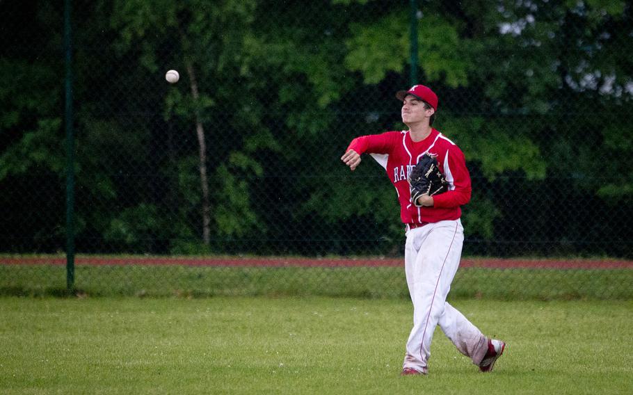 Kaiserslautern's William Frost throws the ball in after catching a fly ball during the DODEA-Europe Division I baseball championship at Ramstein Air Base, Germany, on Saturday, May 28, 2016. Kaiserslautern lost to Ramstein 3-0.