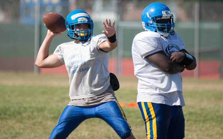 Hiromi Inglesias is the presumptive starter at quarterback for the Ansbach Cougars, but he's in a fierce battle with his brother, Dahomey, for the top spot. Here, Hiromi Inglesias passes during a practice held Saturday, Aug. 27, 2016 in Ansbach, Germany.