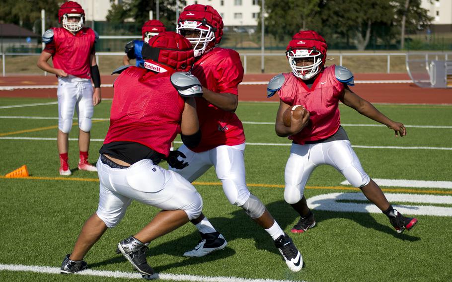 The Kaiserslautern football team practices tackling and blocking at Vogelweh, Germany, on Tuesday, Aug. 30, 2016.