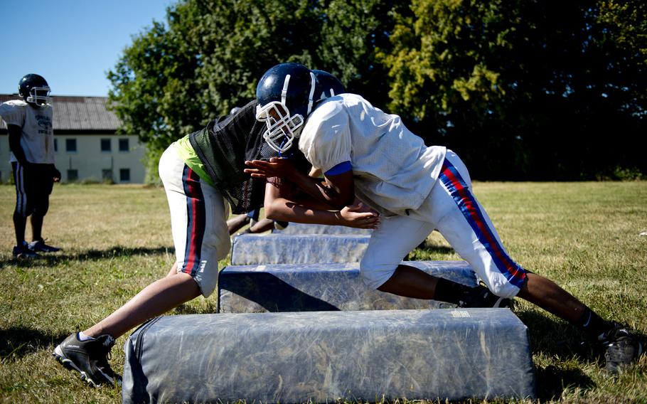 The Bitburg football team practices line drills in Bitburg, Germany, on Thursday, Aug. 25, 2016.