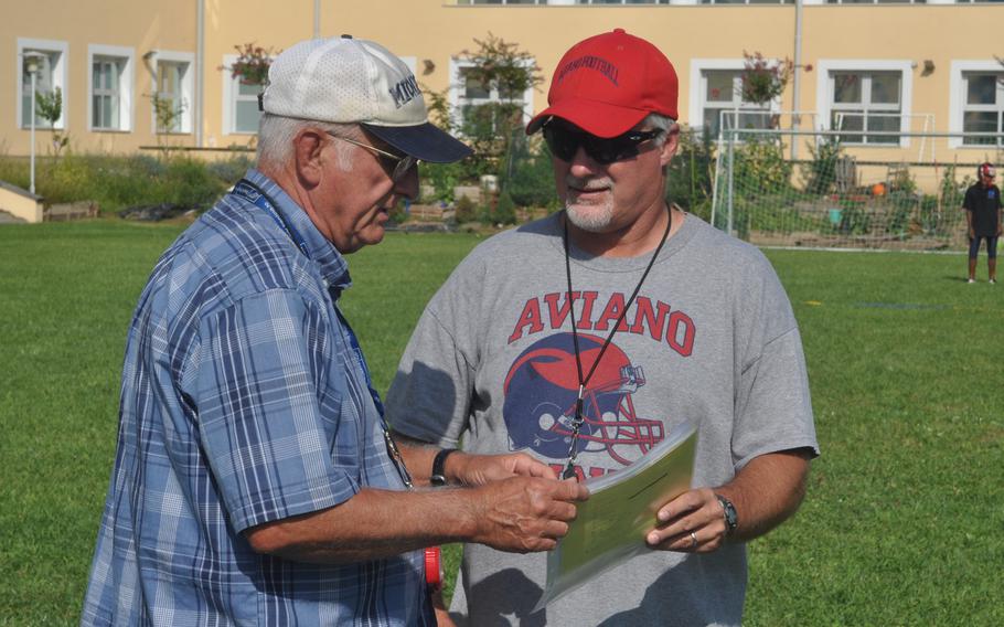 Aviano has never had a head football coach other than Rick Dahlstrom, right, and Ken McNeely. McNeely retired a few years ago and is helping out as a volunteer assistant. McNeely launched the school's program in 1974 and Dahlstrom took over more than a decade ago when McNeely narrowed his focus to basketball.