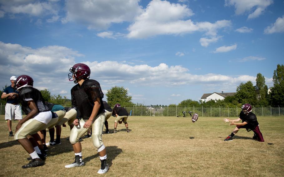 The Baumholder Bucs practice extra point plays in Baumholder, Germany, on Wednesday, Aug. 31, 2016.