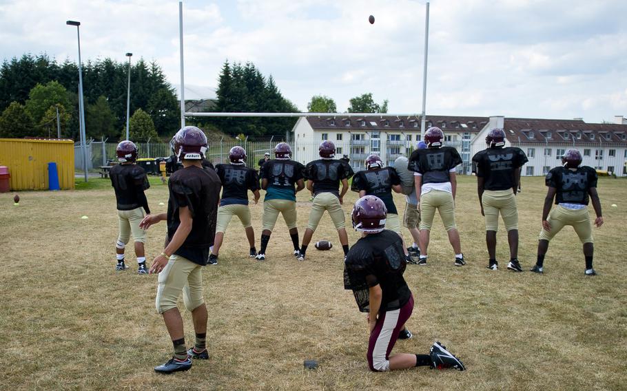 The Baumholder football team practices kicking extra points in Baumholder, Germany, on Wednesday, Aug. 31, 2016.