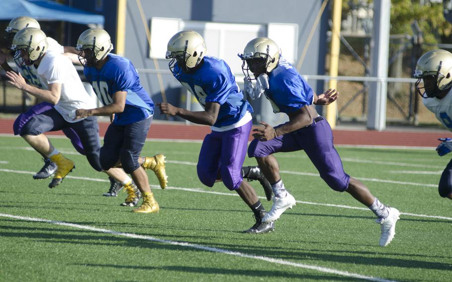 Wiesbaden football players run conditioning drills to close out a practice session Wednesday, Sept. 7, 2016. After the drills, the defense was quickly tasked with getting into various formations to test their ability to think quickly when tired.