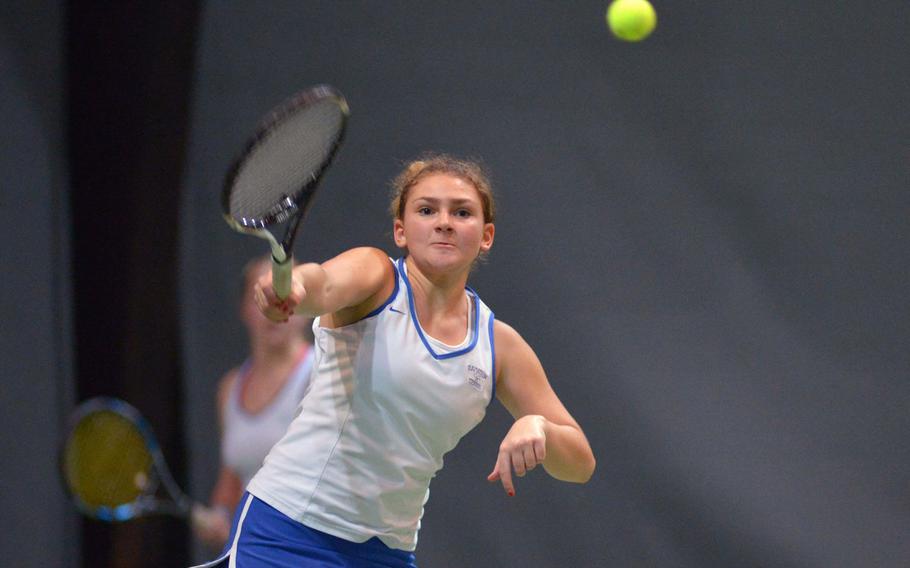 Ramstein's Amanda Daly attacks the ball at the net in a girls doubles semifinal against Vicenza at the DODEA-Europe tennis championships in Wiesbaden, Germany, Friday, Oct. 30, 2015. 


