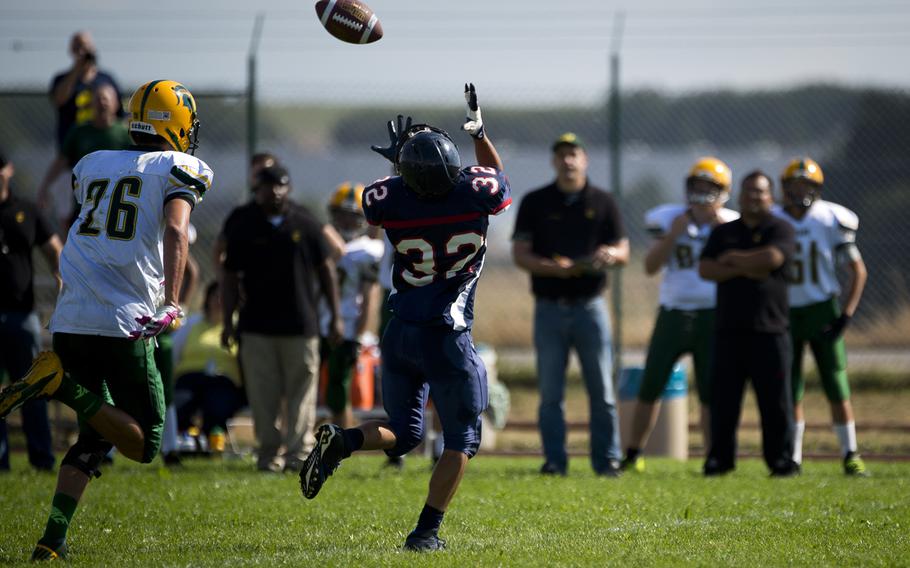 Bitburg Baron Trey Bowles catches a pass in Bitburg, Germany, on Saturday, Sept. 17, 2016. Bitburg defeated the SHAPE Spartans 44-3. 