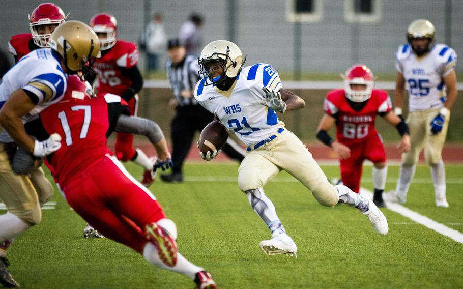 Wiesbaden Warrior Andre Sterling runs the ball in Kaiserslautern, Germany, on Friday, Sept. 23, 2016. The Warriors defeated the Kaiserslautern Raiders 26-7.