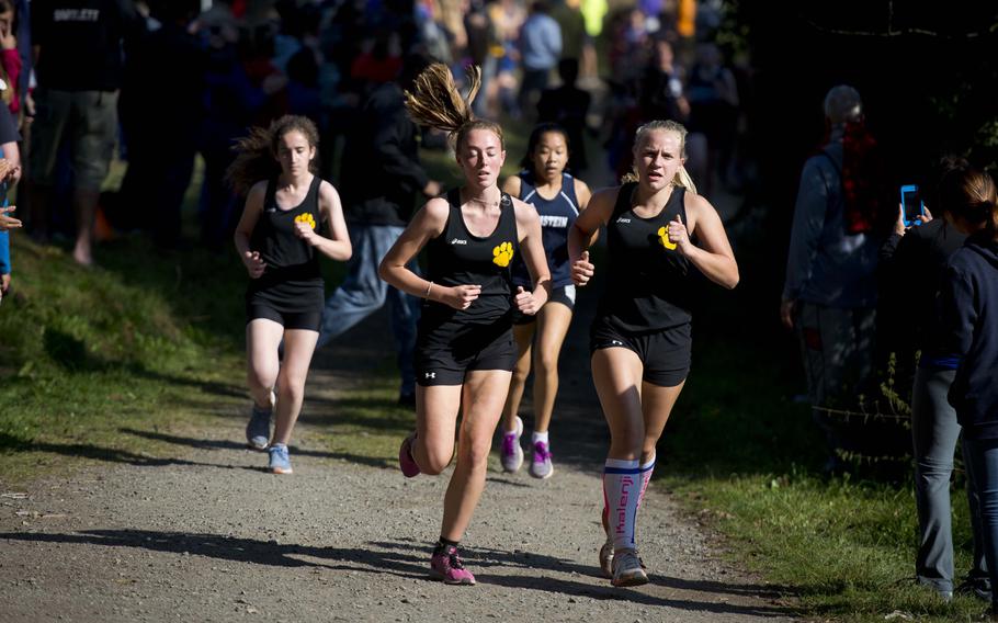 Runners head down a straight away in Ramstein-Miesenbach, Germany, on Saturday, Sept. 24, 2016.