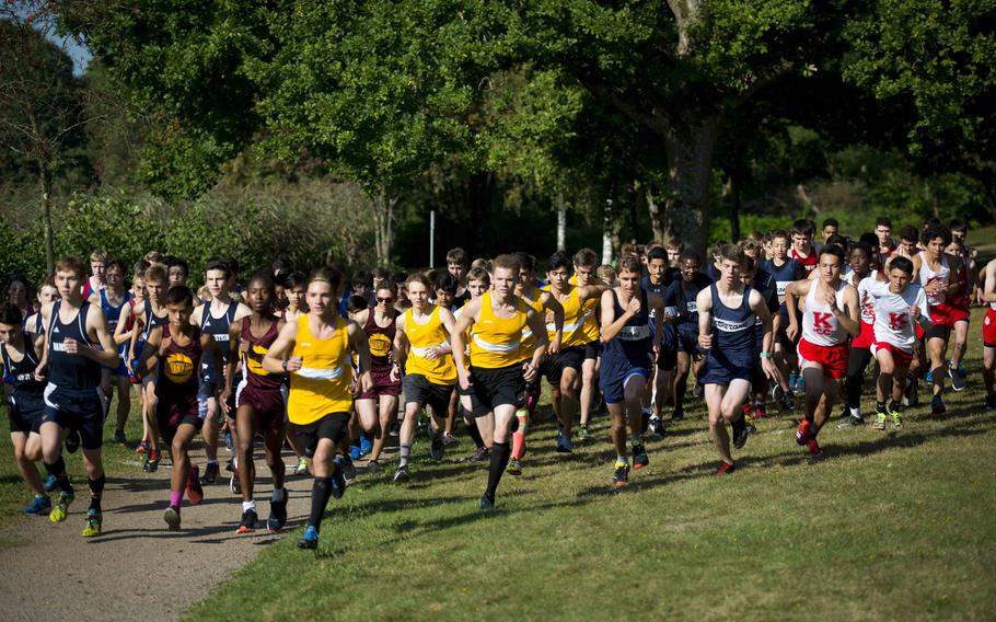 Runners take off from the starting line during a cross country meet in Ramstein-Miesenbach, Germany, on Saturday, Sept. 24, 2016. Ninety-three boys competed. 