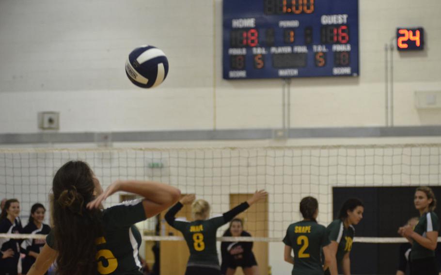 SHAPE volleyball player Mini Teekantonr serves the ball during a game against the Bitburg Lady Barons at RAF Lakenheath, England, Saturday, Sept. 24, 2016. SHAPE suffered close back-to-back defeats.