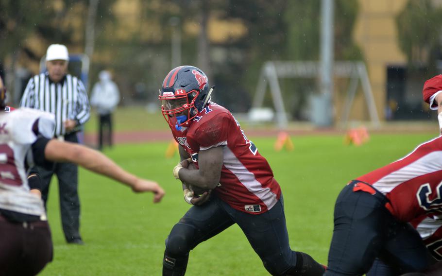 Lakenheath running back Marcus Smith rushes against Vilseck during a varsity football game at RAF Lakenheath, England, Saturday, Oct. 1, 2016. Smith rushed for 200 yards and one touchdown in the game.