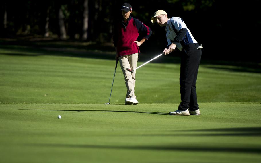 Ramstein's Jonathan Ciero watches his putt during the DODEA-Europe golf championship at Rheinblick golf course in Wiesbaden, Germany on Oct. 5, 2016.