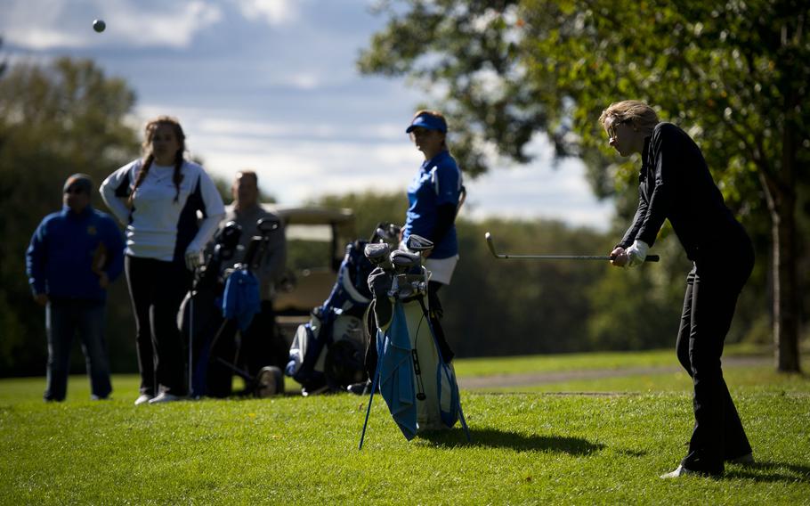 Stuttgart's Sydney Smith chips a shot to the green during the DODEA-Europe golf championship at Rheinblick golf course in Wiesbaden, Germany on Oct. 5, 2016.