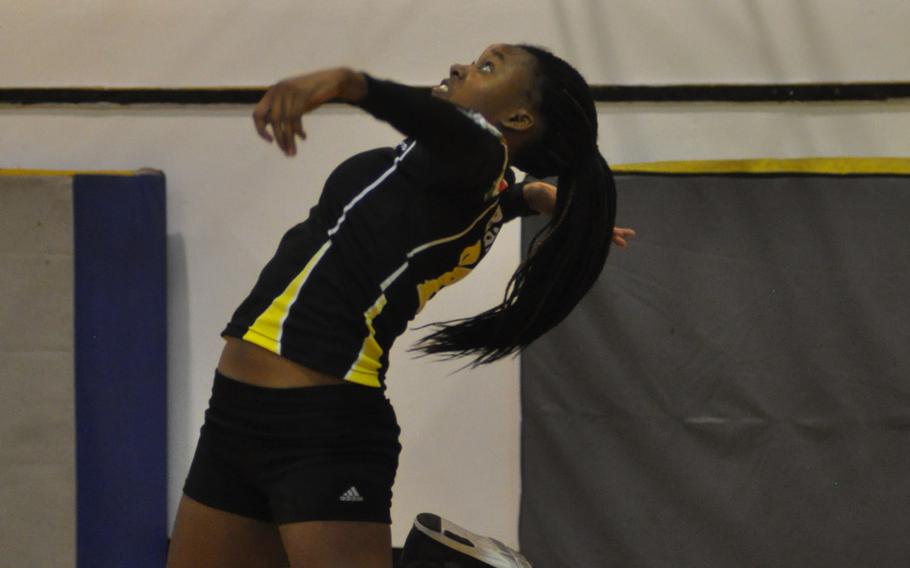 Vicenza's Britney Bailey leaps in the air during a jump serve Friday, Oct. 7, 2016, as the Cougars fell to defending European champion Stuttgart.
